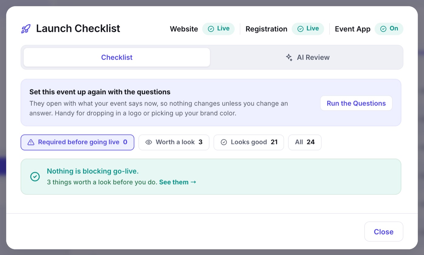 The Launch Checklist: Website, Registration and Event App status pills, the Checklist and AI Review tabs, the band offering to run the setup questions again, and the filters Required before going live, Worth a look, Looks good and All